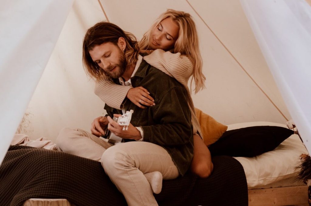 Glamping for couples hugging