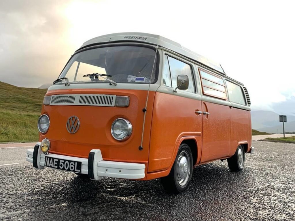 This image shows someone travelling and wild camping in a motorhome in Scotland
