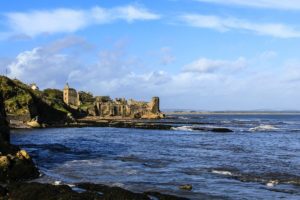Image showing the castle of St Andrews in Scotland, overlooking the water. The perfect place for wild camping.
